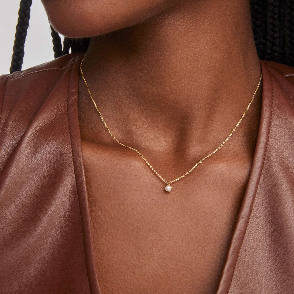 Delicate Gold Clavicle Chain With A Single Pearl